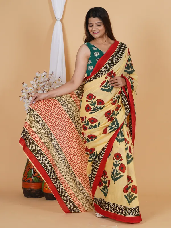 Elegant_Floral_Handblock_Print_Cotton_Saree_With_Red_Border
