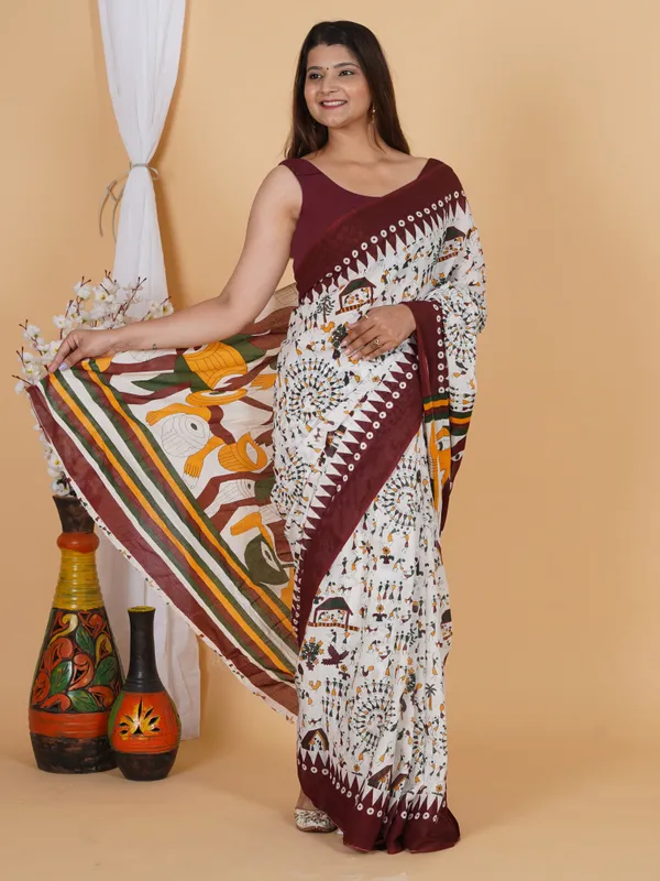 Elegant_Tribal_Art_Printed_Cotton_Saree_–_Maroon_Border_Designer_Saree