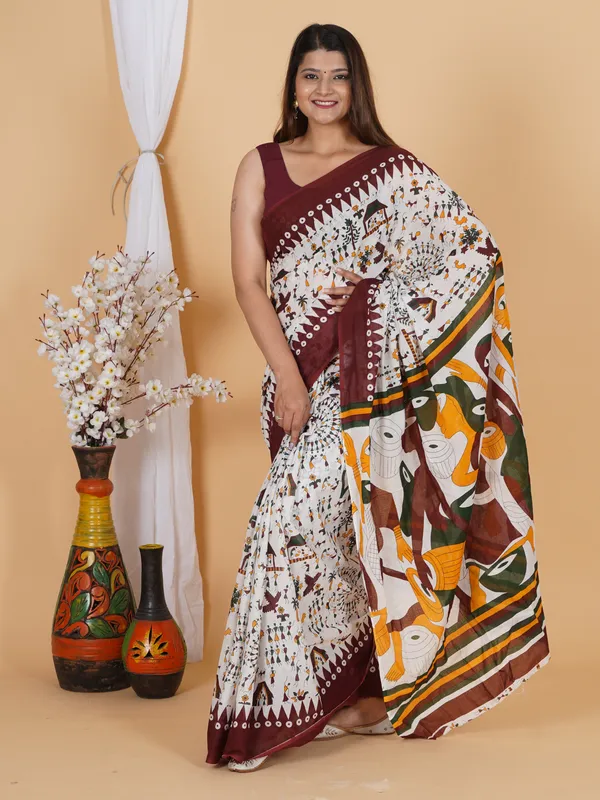 Elegant_Tribal_Art_Printed_Cotton_Saree_–_Maroon_Border_Designer_Saree