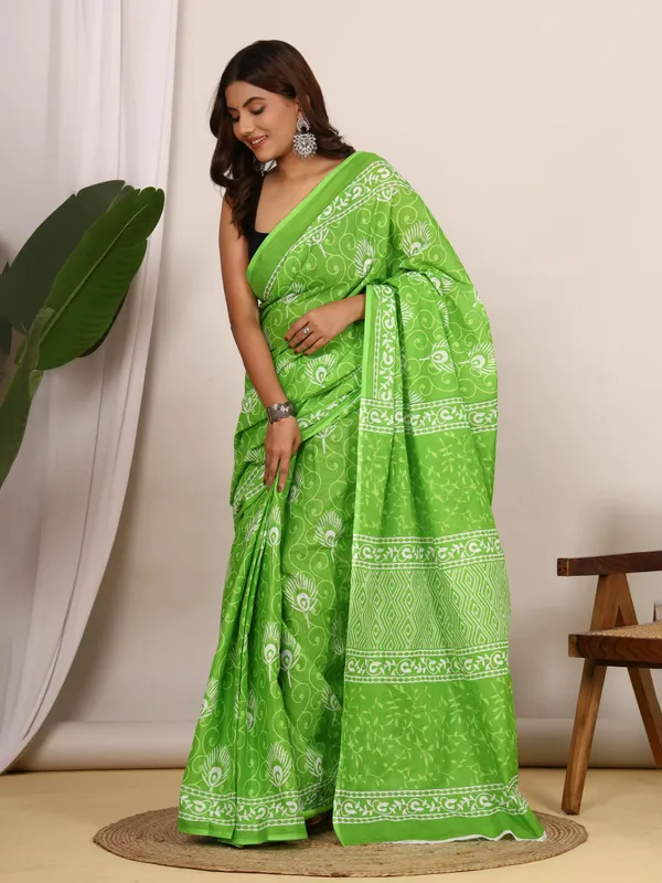 Green_Peacock_Printed_Cotton_Saree_with_Ethnic_Border_|_Elegant_Designer_Cotton_Saree_for_Women