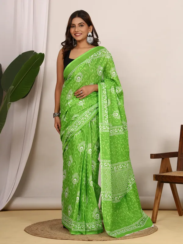 Green_Peacock_Printed_Cotton_Saree_with_Ethnic_Border_|_Elegant_Designer_Cotton_Saree_for_Women