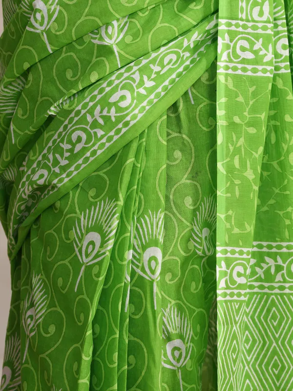 Green_Peacock_Printed_Cotton_Saree_with_Ethnic_Border_|_Elegant_Designer_Cotton_Saree_for_Women