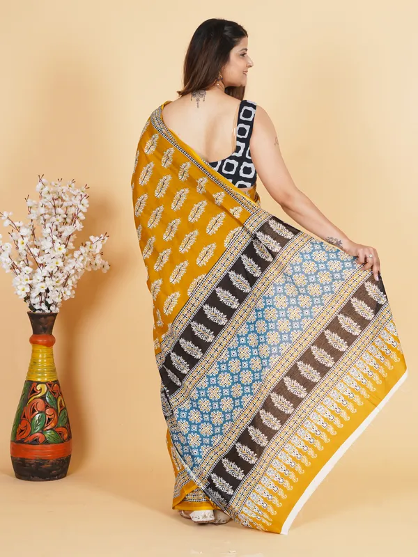 Mustard_Yellow_Printed_Saree_with_Contrast_Border_&_Designer_Blouse