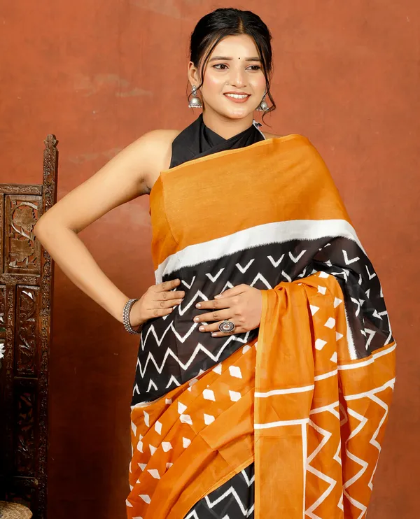 Mustard_Yellow_&_Black_Handloom_Ikat_Print_Cotton_Saree_with_Elegant_Border_|_Softspun_Fabrics