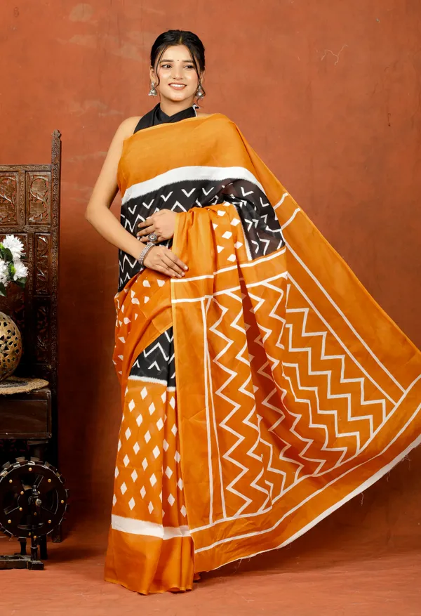 Mustard_Yellow_&_Black_Handloom_Ikat_Print_Cotton_Saree_with_Elegant_Border_|_Softspun_Fabrics