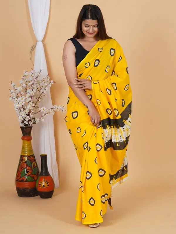 Sunshine_Yellow_Abstract_Print_Cotton_Saree_with_Designer_Border