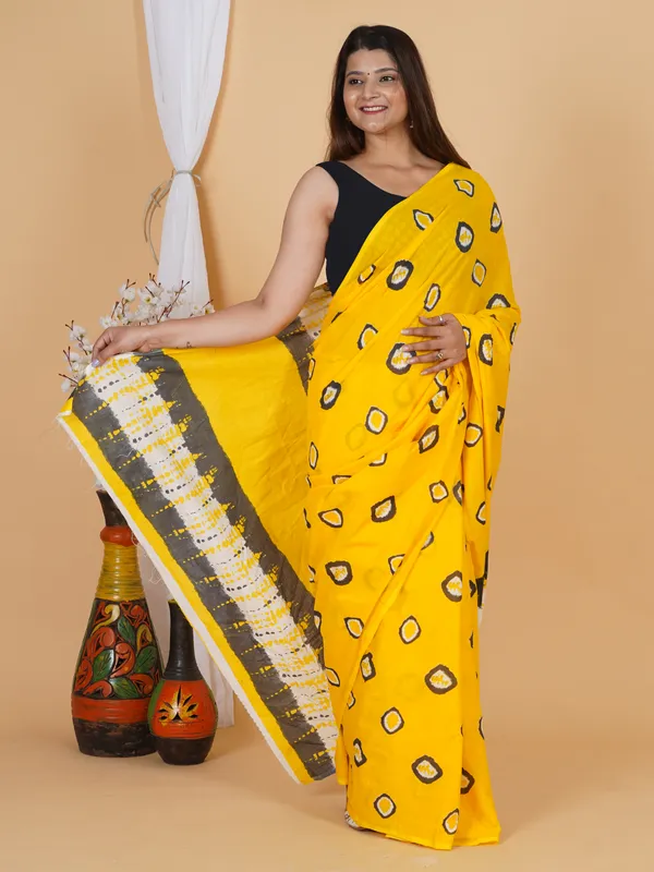 Sunshine_Yellow_Abstract_Print_Cotton_Saree_with_Designer_Border