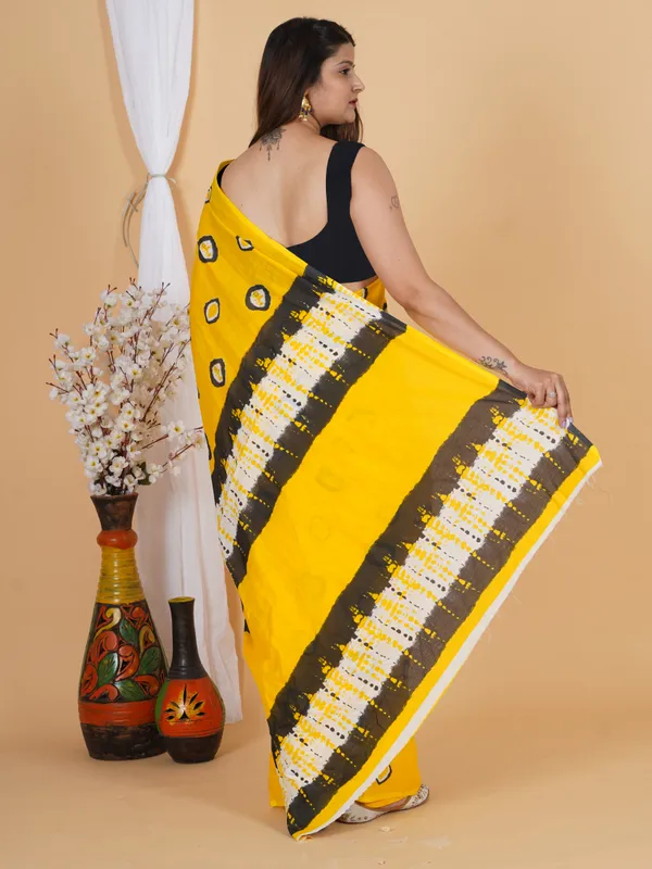 Sunshine_Yellow_Abstract_Print_Cotton_Saree_with_Designer_Border
