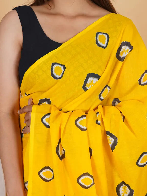 Sunshine_Yellow_Abstract_Print_Cotton_Saree_with_Designer_Border