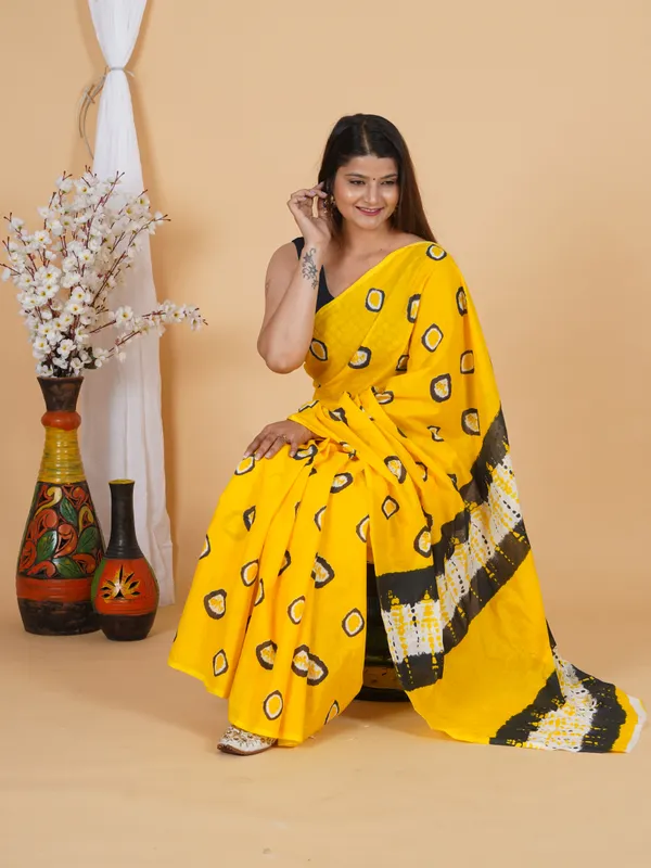 Sunshine_Yellow_Abstract_Print_Cotton_Saree_with_Designer_Border