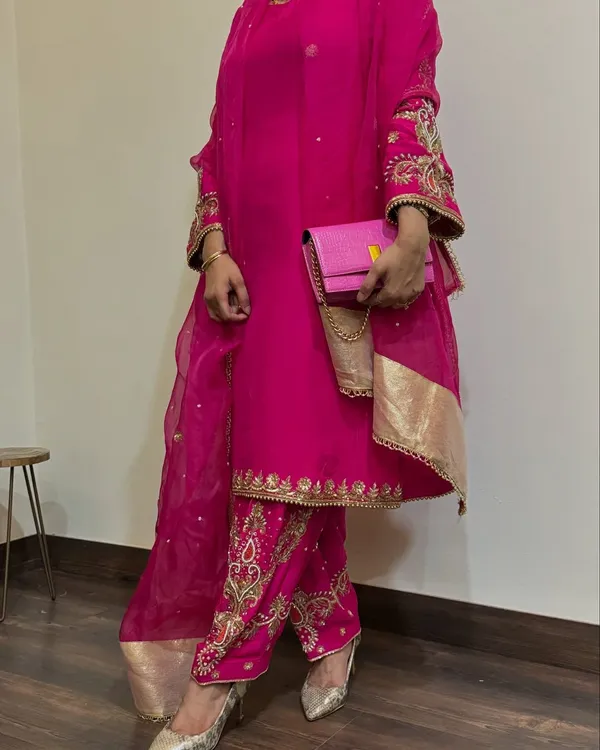 Pink_Georgette_Premium_&_Fancy_Design_Suit_Set_For_Women