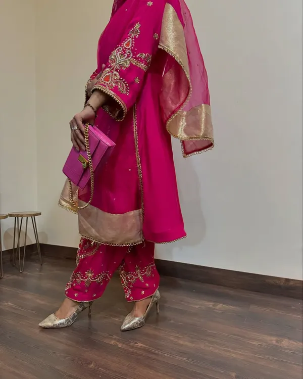 Pink_Georgette_Premium_&_Fancy_Design_Suit_Set_For_Women