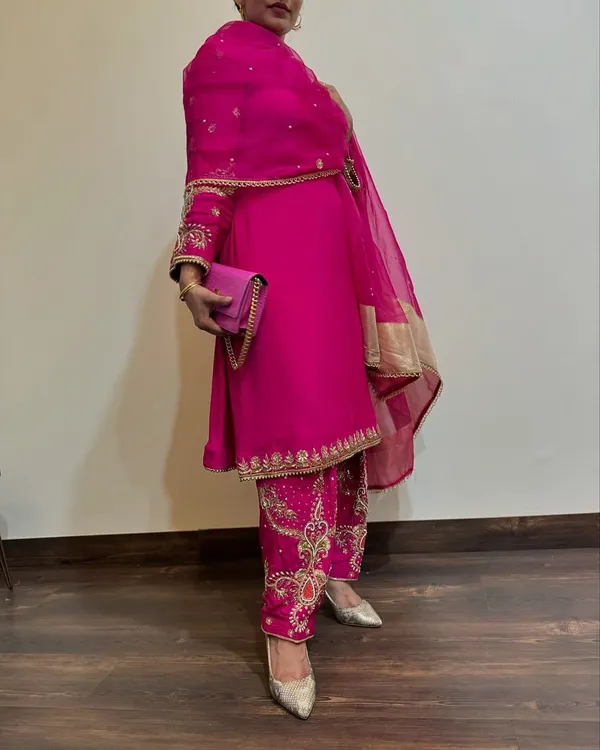 Pink_Georgette_Premium_&_Fancy_Design_Suit_Set_For_Women