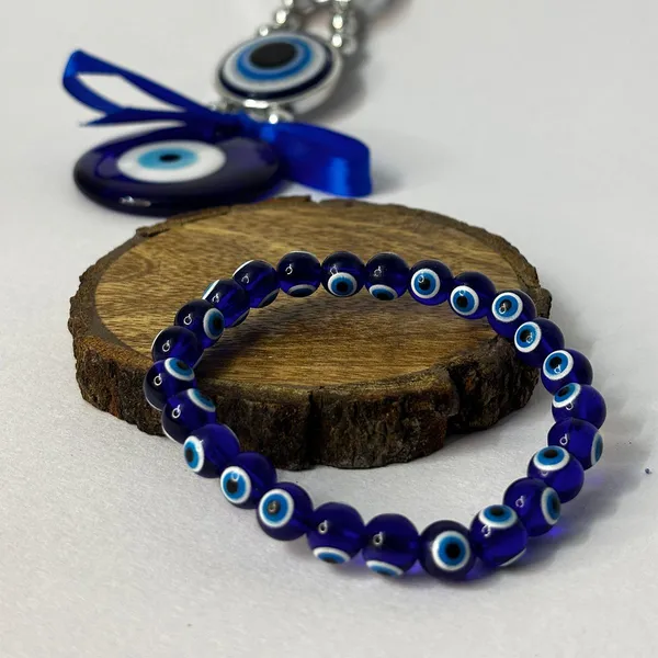 Blue_Crystal_Stone_Glass_Evil_Eye_Charm_For_Unisex