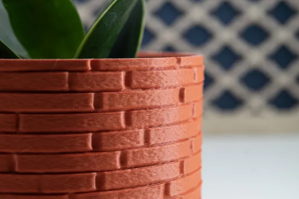 Indoor_Plant_Pot_With_Bricks_Texture
