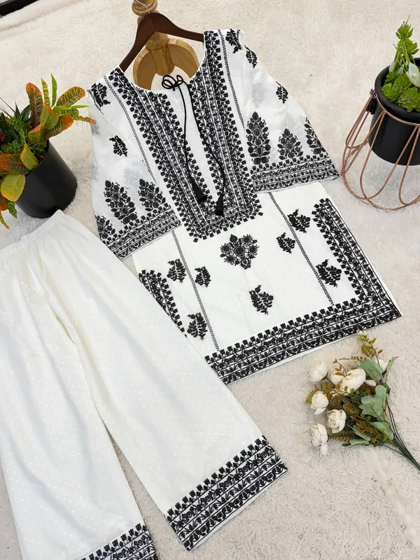 PRESENTING_NEW_DESIGNER_COLLECTION_IN_WHITE_RAYON_BUTTI_SILK_WITH_EMBROIDERED_CHAIN_STITCH_WORK_FOR_WOMEN