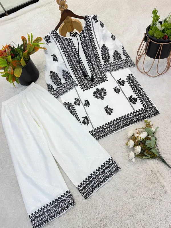 PRESENTING_NEW_DESIGNER_COLLECTION_IN_WHITE_RAYON_BUTTI_SILK_WITH_EMBROIDERED_CHAIN_STITCH_WORK_FOR_WOMEN