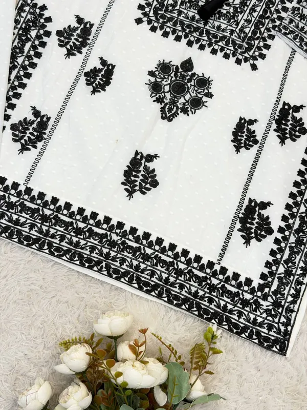 PRESENTING_NEW_DESIGNER_COLLECTION_IN_WHITE_RAYON_BUTTI_SILK_WITH_EMBROIDERED_CHAIN_STITCH_WORK_FOR_WOMEN
