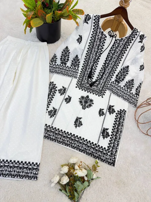 PRESENTING_NEW_DESIGNER_COLLECTION_IN_WHITE_RAYON_BUTTI_SILK_WITH_EMBROIDERED_CHAIN_STITCH_WORK_FOR_WOMEN