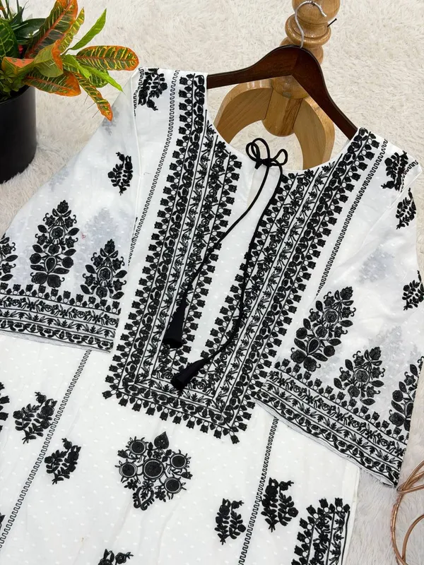 PRESENTING_NEW_DESIGNER_COLLECTION_IN_WHITE_RAYON_BUTTI_SILK_WITH_EMBROIDERED_CHAIN_STITCH_WORK_FOR_WOMEN