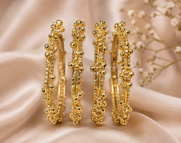 Golden_Set_Of_4_Ghungroo_Studded_Kashmiri_Bangles