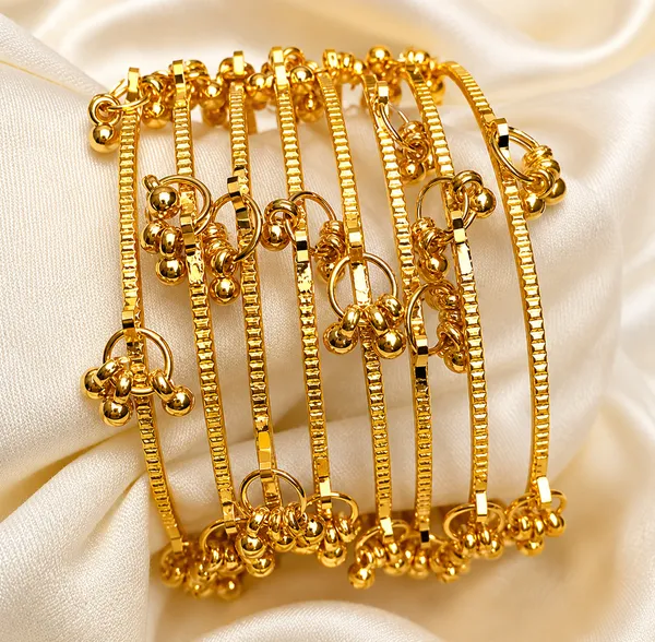Golden_Set_Of_8_Multicut_Ghungroo_Studded_Kashmiri_Bangles