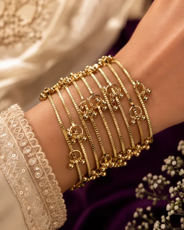 Golden_Set_Of_8_Multicut_Ghungroo_Studded_Kashmiri_Bangles