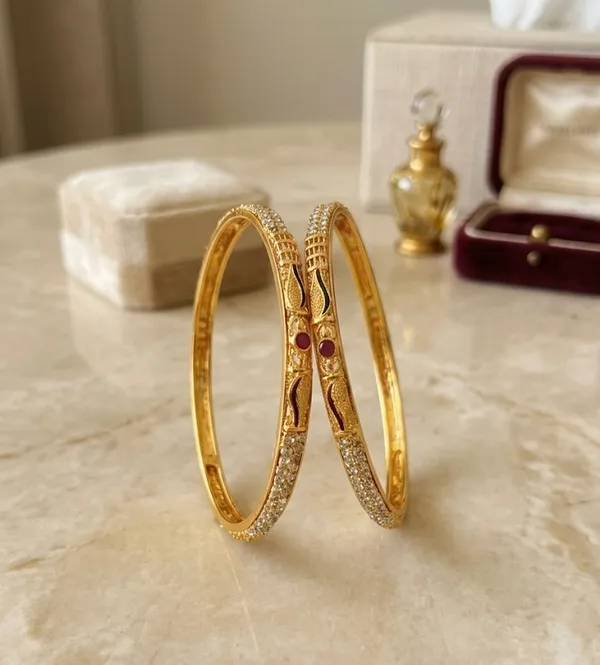 Gold-Plated_Bangles_with_Ruby_Accents_and_Intricate_Detailing