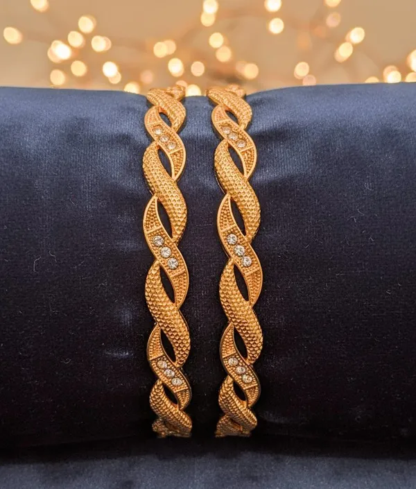 Golden_Twisted_Bangles_With_Stone_Accents_Set_Of_2_For_Women