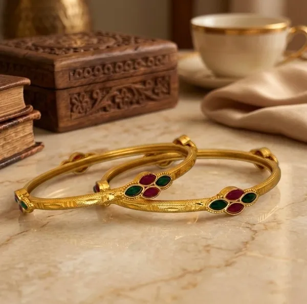 Gold-Toned_Bangles_with_Ruby_and_Emerald_Stone_Embellishments_(Set_of_2)