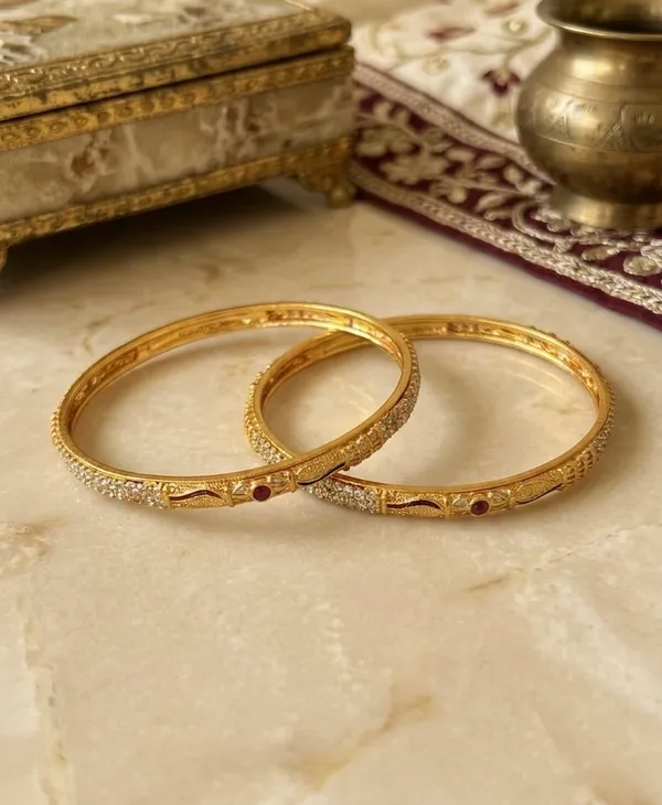 Gold-Plated_Bangles_with_Ruby_Accents_and_Intricate_Detailing