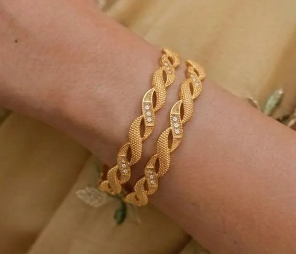 Golden_Twisted_Bangles_With_Stone_Accents_Set_Of_2_For_Women