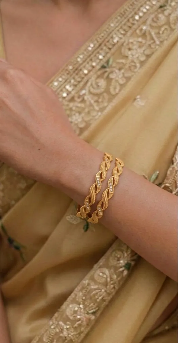 Golden_Twisted_Bangles_With_Stone_Accents_Set_Of_2_For_Women
