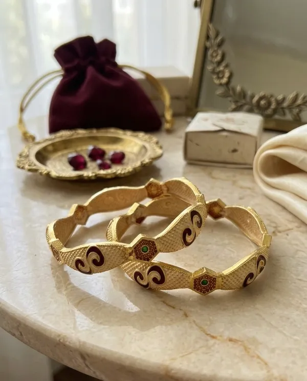 Traditional_Gold-Toned_Designer_Bangles_with_Red_Enamel_Work_and_Green_Stone_Accents_(Set_of_2)