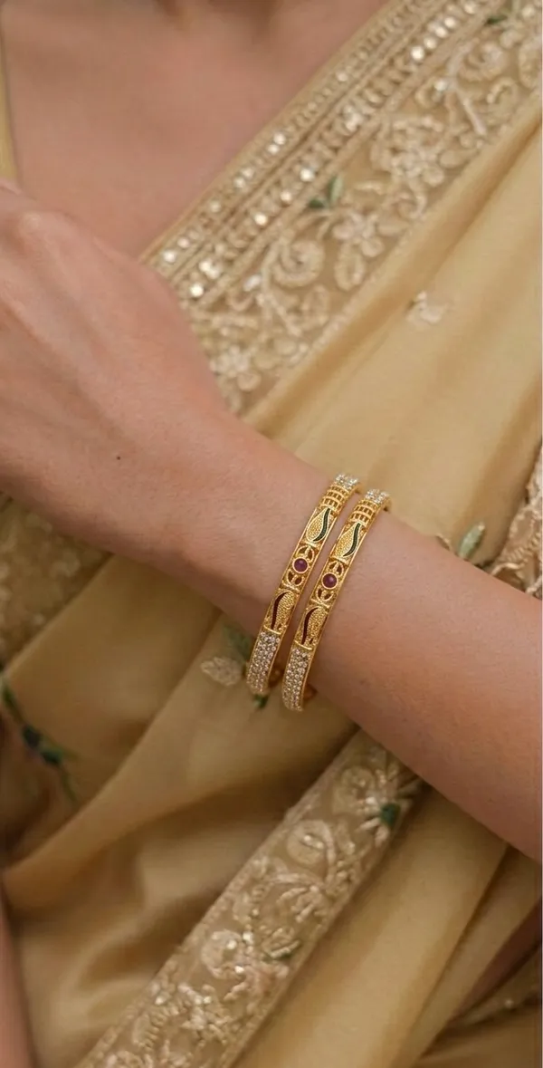 Gold-Plated_Bangles_with_Ruby_Accents_and_Intricate_Detailing