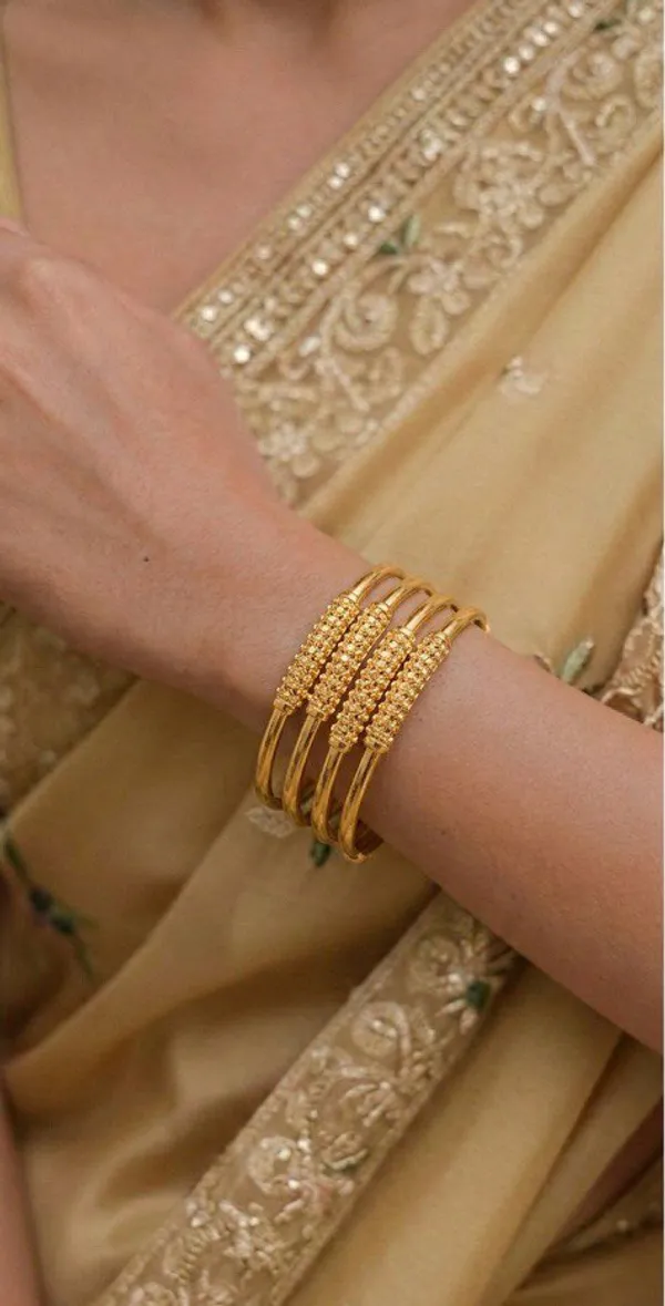 Golden_Textured_Bangle_Set_Traditional_Design_With_Ornate_Centerpiece_For_Women