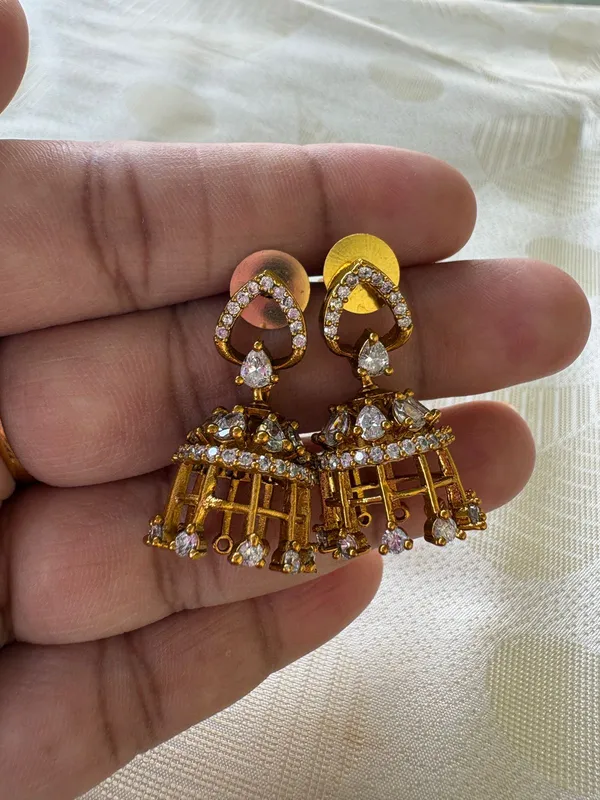 Gold_Toned_Jhumka_Earrings_With_Heart_Motif_And_Crystal_Embellishments