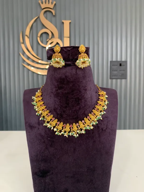 Traditional_AntiqueTemple_style_Gold_Toned_Necklace_Set_With_Green_And_Maroon_Beads