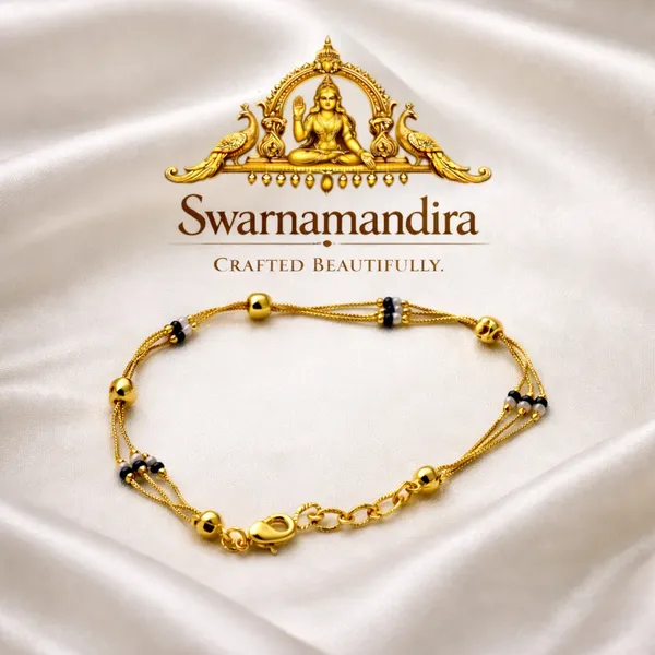 Gold_Plated_Multi_Strand_Bracelet_With_Black_Beads