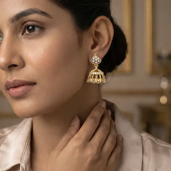Gold_Toned_Floral_Jhumka_Earrings_With_White_Stone_Embellishments
