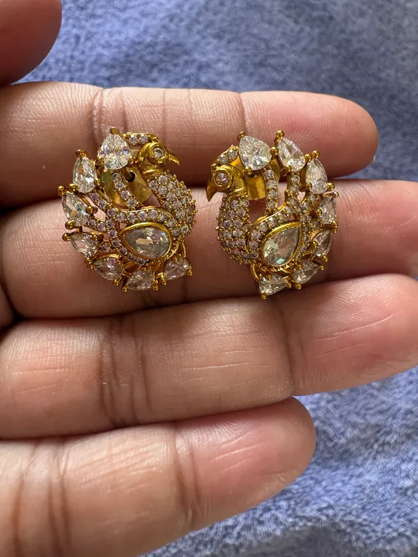 Gold_Toned_Kundan_Style_Statement_Earrings_With_Crystal_Embellishments