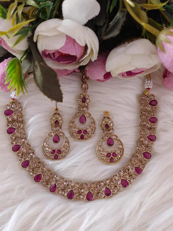 Traditional_Polki_Jewelry_Set_With_Ruby_Accents_-_Necklace_And_Earrings