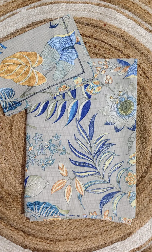 Tropical_Leaf_Print_Bedsheet_Set_With_Pillow_Covers_-_Beige_Base_With_Blue_And_Yellow_Botanical_Design