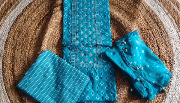 Beauty_with_Blue_Unstitched_Suit_Material_With_Bandhej_Dupatta