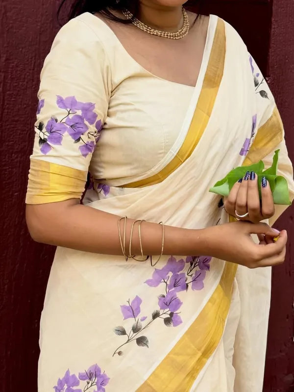 Elegant_Chiku_Linen_Kerala_Saree_With_Digital_Floral_Print_&_Gold_Jari_Border
