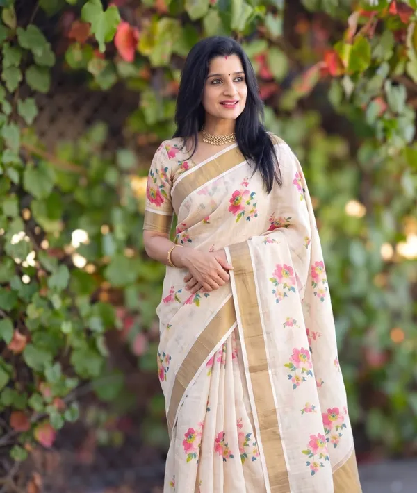 Elegant_Chiku_Linen_Kerala_Saree_With_Digital_Floral_Print_&_Gold_Jari_Border
