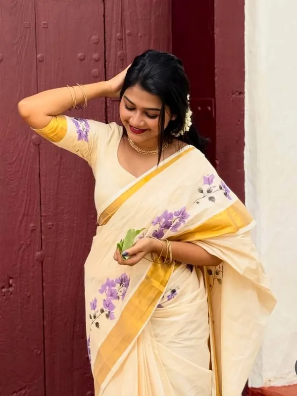 Elegant_Chiku_Linen_Kerala_Saree_With_Digital_Floral_Print_&_Gold_Jari_Border