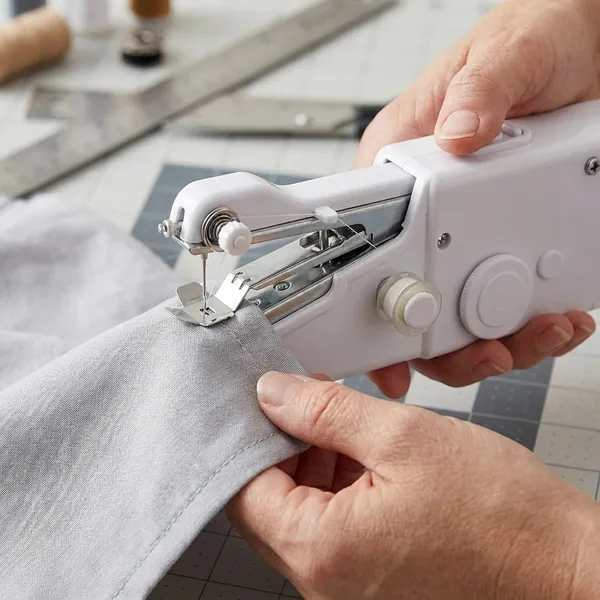 Portable_Handy_Stitch_Mini_Sewing_Machine_–_DAILY_BUYZ