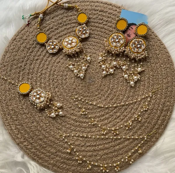 Traditional_Gold_Toned_Kundan_Pearl_Jewelry_Set_With_Jhumka_Earrings_And_Maang_Tikka
