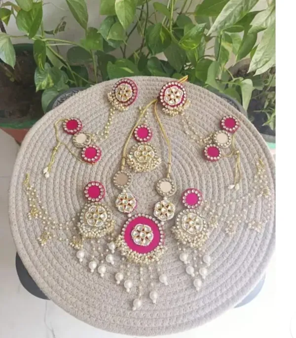 Traditional_Pink_Stone_And_Pearl_Bridal_Jewelry_Set_With_Maang_Tikka_And_Earrings